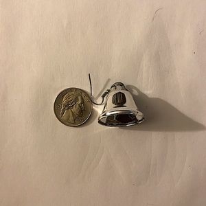Size compared to a quarter: Silver bell Christmas earrings.